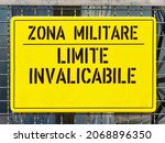 Small photo of sign ban outside the military area with the italian text translation: Military zone insurmountable limit