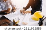 Small photo of Diverse Team of Specialists Use Tablet Computer on Construction Site. Real Estate Building Project with Civil Engineer, Architect, Business Investor and General Worker Discussing Plan Details.