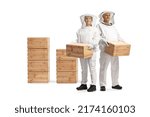 Male And Female Bee Keepers In...