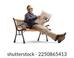 Mature man sitting on bench and ...