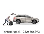 Man pushing a spare car tire towards a SUV isolated on white background