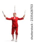 Small photo of Performer in a red suit holding juggling clubs with head isolated on white background