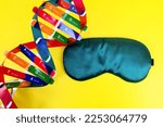 Small photo of DNA and sleeping mask metaphor sleeping, DNA effect how individuals need rest and sleep. Disruption of sleeping can cause DNA damage. DNA damage can be another deleterious effect of bad sleep.