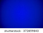 Gradient glowing royal blue background, bright saturated color, soft focus.
