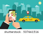 booking taxi via mobile app.... | Shutterstock .eps vector #537661516