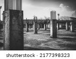 concrete building under construction in bandung, indonesia in black and white