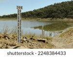 The water level meter of this dam demonstrates the scarcity of water that exists due to the lack of rain, there is drought and lack of water.