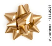 Gold bow sparkling holiday gift ...