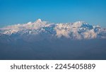 Small photo of Panoramic beautiful view of mount Trisul, Nanda Devi with the beautiful sky on the way to Binsar, Kasardevi, Almora Uttarakhand