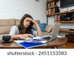Young stressed woman having...