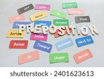 Small photo of colorful English grammar word cards on white desk for training in class