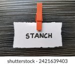 Small photo of Stanch writting on table background.