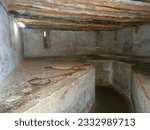 Small photo of Slaves holding cell where many people were packed in inhumane conditions waiting to be sold at last slave market in Zanzibar Tanzania 30 December 2013