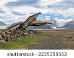 Small photo of Skeidara Bridge Monument Iceland, remains of Gigjukvisl steel bridge after a glacial outburst and flood of icebergs in 1996 near Svinafell, Iceland