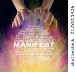 Small photo of Circular Word Cloud associated with Manifesting what you want - female hands hovering above a circle of words relevant to MANIFEST against a flowing fire like background with black behind