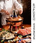 Small photo of Beijing traditional hot pot combo, with mutton slices and seafood platter，Red Grouper. It’s very popular in winter.beijing hot pot