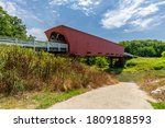 An Old Red Covered Bridge Over...