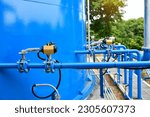 Small photo of Water gate and electric actuator with steel pipe close up image. Select focus of drink water piping. Flange Pipe Fitting
