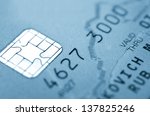 Details of a credit card with chip and numbers. Macro.
