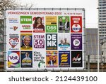 Small photo of Eindhoven, The Netherlands - February 16 2022: Dutch municipal council elections gemeenteraad: VVD, Groenlinks, D66, SP, 50plus, Feestpartij, Piratenpartij, FvD, Volt, Denk, PvdA, Christen unie, PvD.