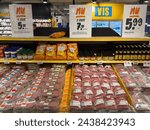 Small photo of Eindhoven, March 16 2024: Sale, promotion or special offer different kind of fresh meat in Jumbo supermarket. Chain will cease promotions chicken, beef and pork across all its stores. Display, serie