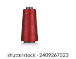 Small photo of spool of industrial thread red, texture of thread on a white background close-up