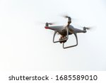 drone copter flying with digital camera in sky