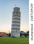 Pisa tower at sunrise without...