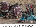 Small photo of Taiz, yemen February 2, 2022 An elderly woman sits next to her tent in the displacement camp after being displaced from her village due to the war.
