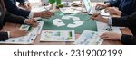 Small photo of Group of business people planning and discussing on recycle reduce reuse policy symbol in office meeting room. Green business company with eco-friendly waste management regulation concept.Trailblazing