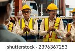 Small photo of Happiness and joyful atmosphere, smiling factory worker and engineer celebrate with factory executive or manager after achieve factory output and surpassing the maximum quota. Exemplifying