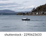 Small photo of Oban, Scotland - April 2023: Dirk, the small boat carrying passengers from Oban over to Oban Marina on the island of Kerrera