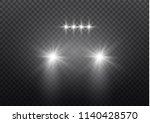 car head lights shining from... | Shutterstock .eps vector #1140428570