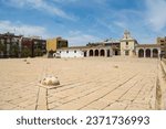 Small photo of Burjassot Valencia Spain on May 21, 2024 Los Silos patio buried stone silos on a hill overlooking the municipality with chapel.