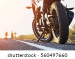 A motorcycle parking on the road right side and sunset, select focusing background.