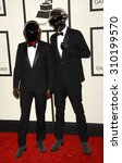 Small photo of LOS ANGELES - JAN 26: Daft Punk arrives at the 56th Annual Grammy Awards Arrivals on January 26, 2014 in Los Angeles, CA