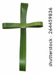 Small photo of Palm Sunday image of cross made out of a palm frond isolated on white. Palm Sunday, which falls before Easter, is a Christian moveable feast to celebrate Jesus' triumphal entrance into Jerusalem