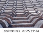Small photo of The roof of an old house, still neatly arranged and sturdy protects the house from the brunt of the weather