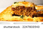 Small photo of Pastitsio - Macarona Bechamel is a Greek dish. This is an Egyptian variation of Italian Lasagna, without the cheese.