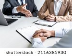 Small photo of Job interview, Two selection committee manager asking questions to applicant about work history, colloquy dream, Skill, expertise, experience and businessman listen to candidate answers.