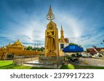 Small photo of PHITSANULOK, THAILAND - October 2,2023:Sun halo with blue sky with Buddha statue at in Temple (Thai language:Wat Chan West) is a Buddhist temple It is a major tourist attraction Phitsanulok,Thailand