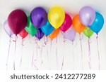 Small photo of Many balloons on a white background with threads hang in space under the stream. Bright different colored helium balloons hanging