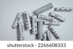 Small photo of Ikea Ladda 2450 AA NiMH rechargeable batteries. A lot of batteries on a white background. Isolated. Orel, Russia - Feb 18 2023.