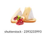 Small photo of Brie cheese. Camembert cheese. Fresh cheese with cranberry jam on a piece of bread. Baguette crackers. Italian, French cheese and berry jam isolated on a white background.