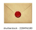 Old mail envelope with wax seal isolated on white