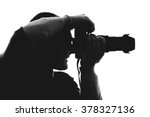 Photographer silhouette isolated on white background