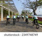Small photo of Central Park, Meikarta, Cikarang Pusat, Bekasi, Indonesia - August 20, 2023: Fun Bike Bekasi "Makin Berani". A series of activities in order to celebrate the 73rd Anniversary of Bekasi Regency