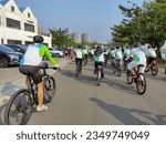 Small photo of Central Park, Meikarta, Cikarang Pusat, Bekasi, Indonesia - August 20, 2023: Fun Bike Bekasi "Makin Berani". A series of activities in order to celebrate the 73rd Anniversary of Bekasi Regency