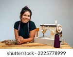 A dressmaker on a sewing machine. Jaguar pattern fabric.