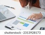 Small photo of Financial advisor calculating numbers datasheets graphs charts reports marketing research development planning management strategy analysis financial accounting. Business office concept.